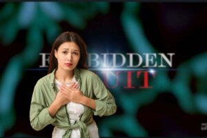 forbidden fruit logo e donna preoccupata in primo piano